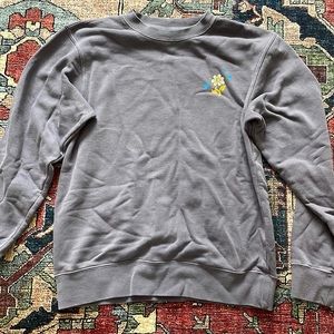 this is an extra small light purple, long sleeve crewneck